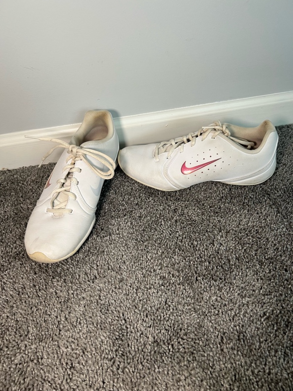 Nike White Low-Top Sneakers with Black Swoosh